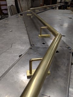 Brass handrail with supports